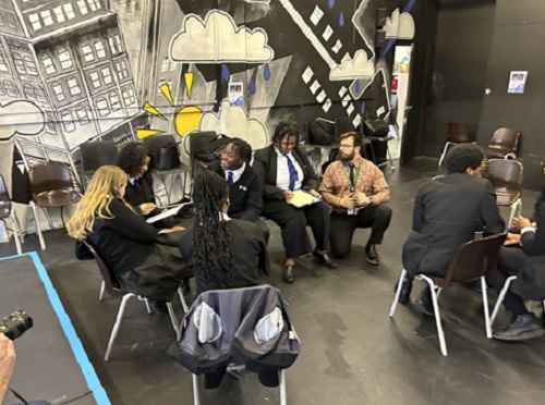Second Wave Speak Out A group of students beging taught how to speak out effectively