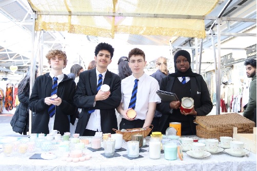 Y10 Students sell candles they have produces on Greenwich Market