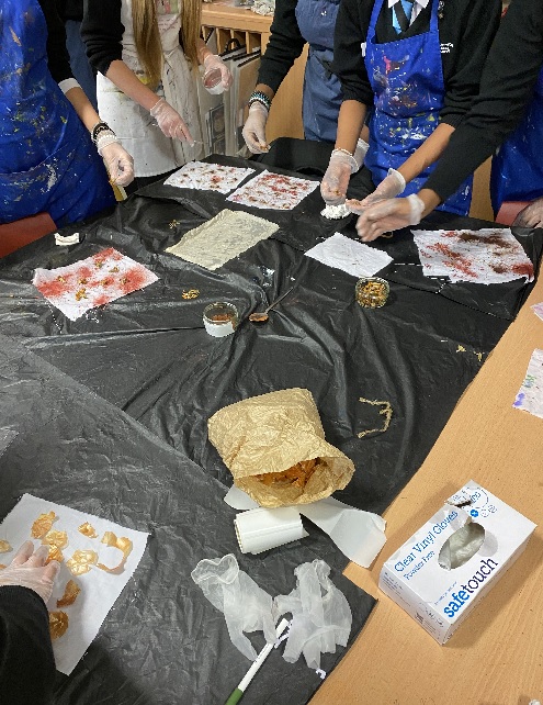 A table covered in creative supplies